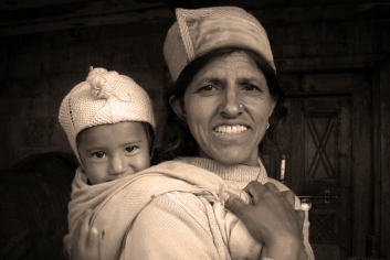 Proud grandma with her grandchild. Chitkul, Himalayas.