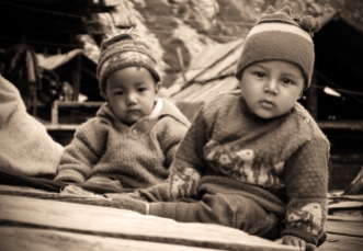 Chitkul babies, wondering what the camera is. Chitkul, Himalayas.