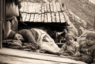 Grandma takes a nap - on the roof, with the babies. Chitkul, Himalayas.